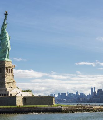 Statue of Liberty and the New York City Skyline, USA.